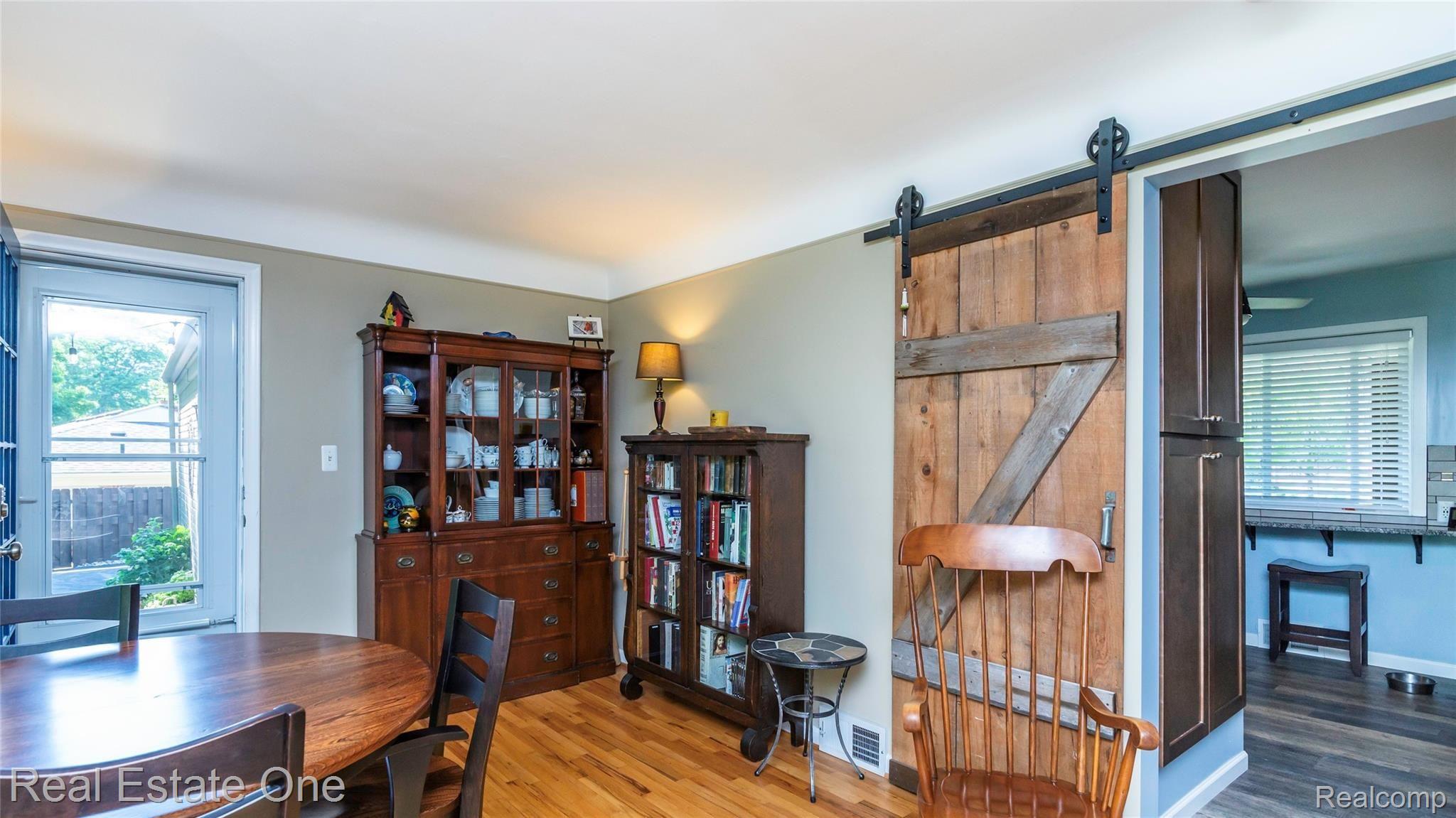 28536 Quail Hollow Road Farmington, MI 48331 - Photo 14 of 48 Family Room w/ barn door