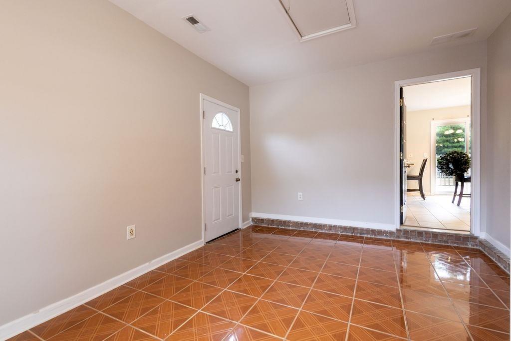 33 Northwest Hunters Glenn Road Northwest Rome, GA 30165 - Photo 14 of 19 a view of a livingroom with wooden floor and a window