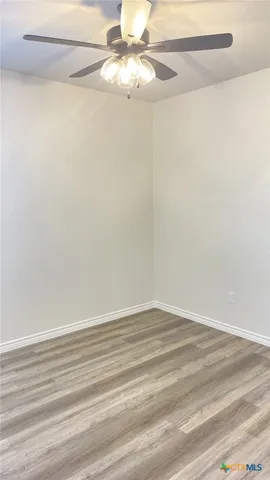 a view of a small space with a fan