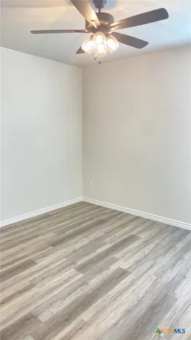 a view of a room with an empty space
