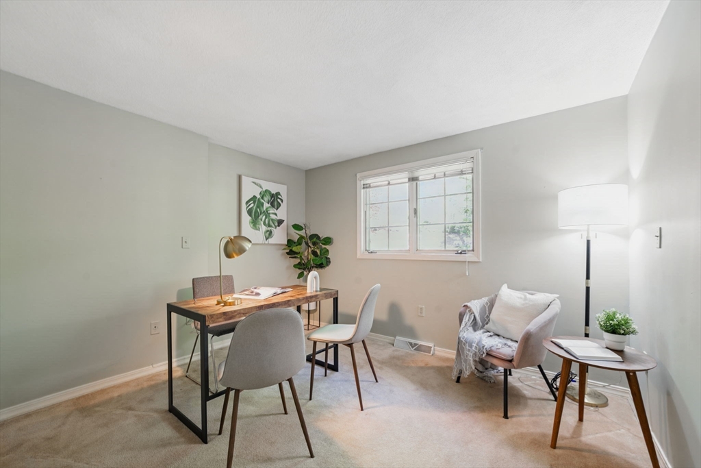 8 Ware Road Winchester, MA 01890 - Photo 12 of 25 a view of a livingroom with furniture and a window