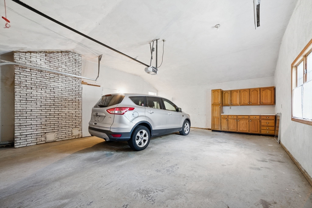 8 Ware Road Winchester, MA 01890 - Photo 20 of 25 a view of car garage