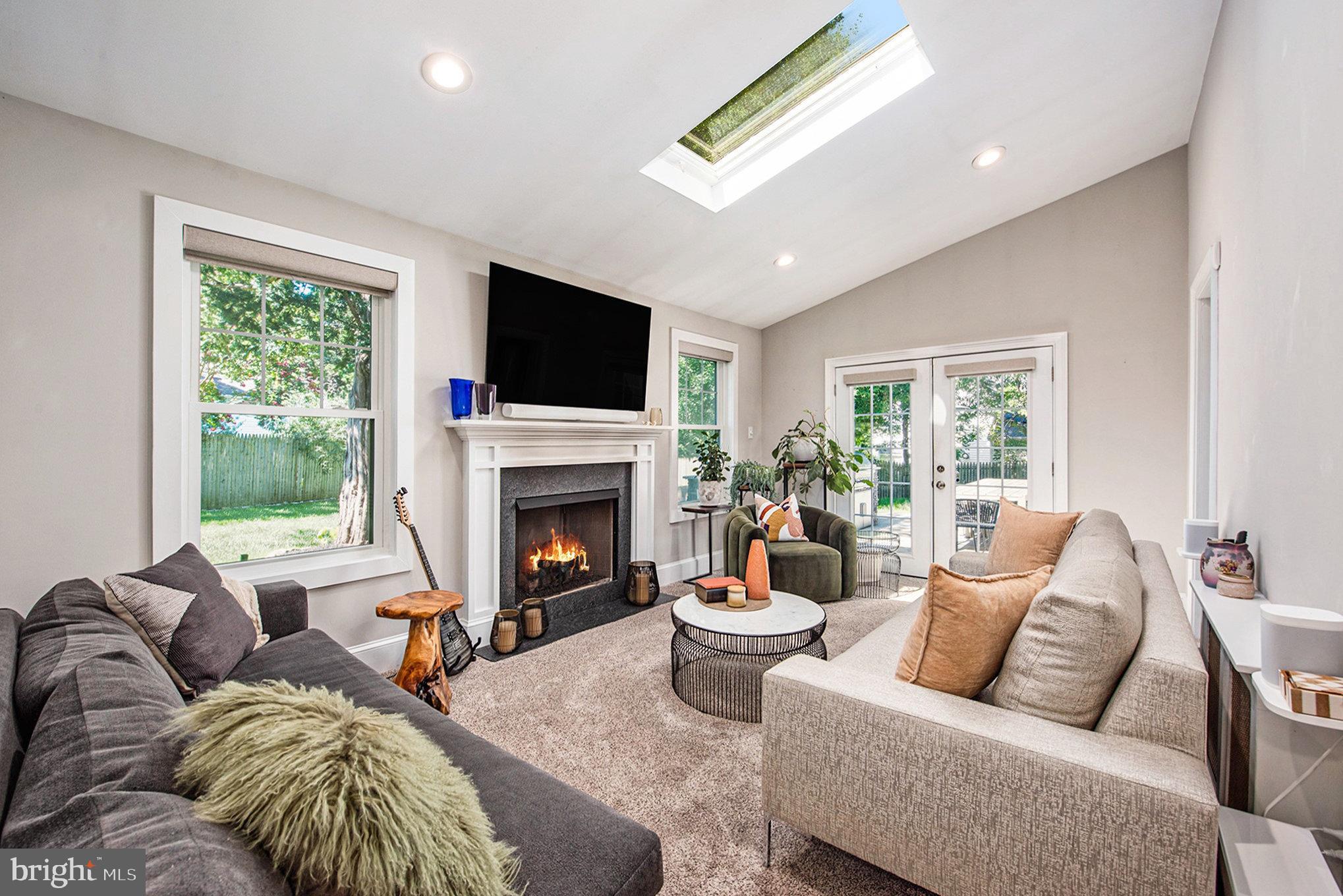 109 Willowburn Road Villanova, PA 19085 - Photo 12 of 65 a living room with furniture fireplace and window