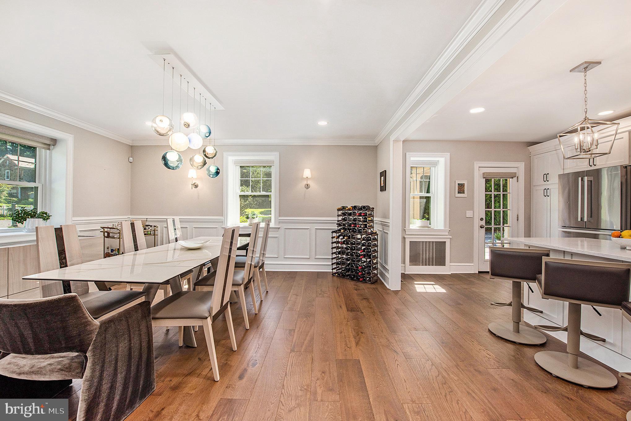 109 Willowburn Road Villanova, PA 19085 - Photo 16 of 65 a view of a dining room with furniture and wooden floor