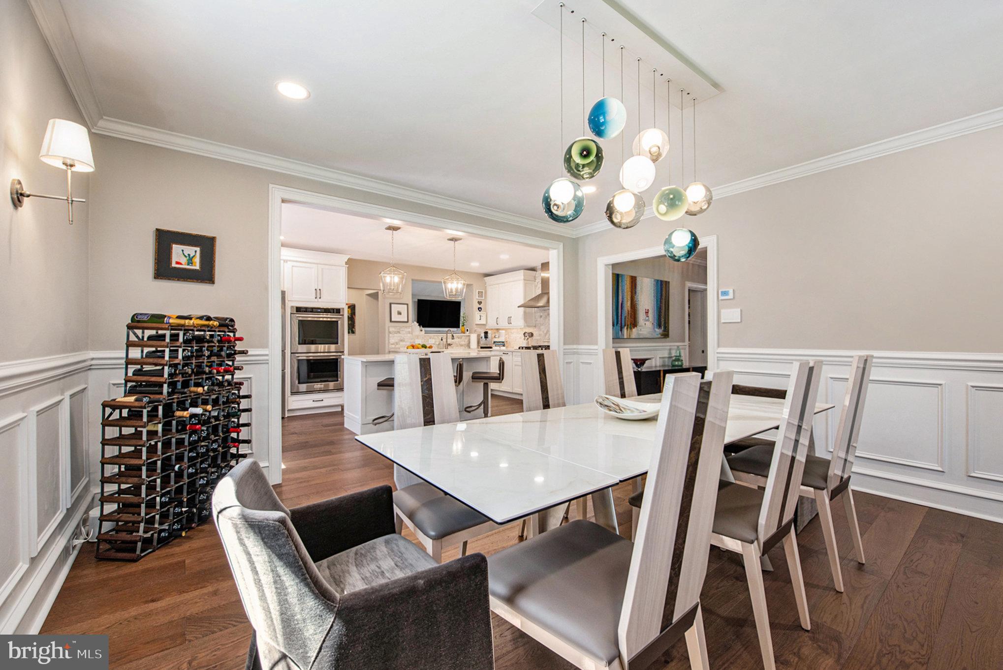 109 Willowburn Road Villanova, PA 19085 - Photo 17 of 65 a view of a dining room with furniture wooden floor and chandelier