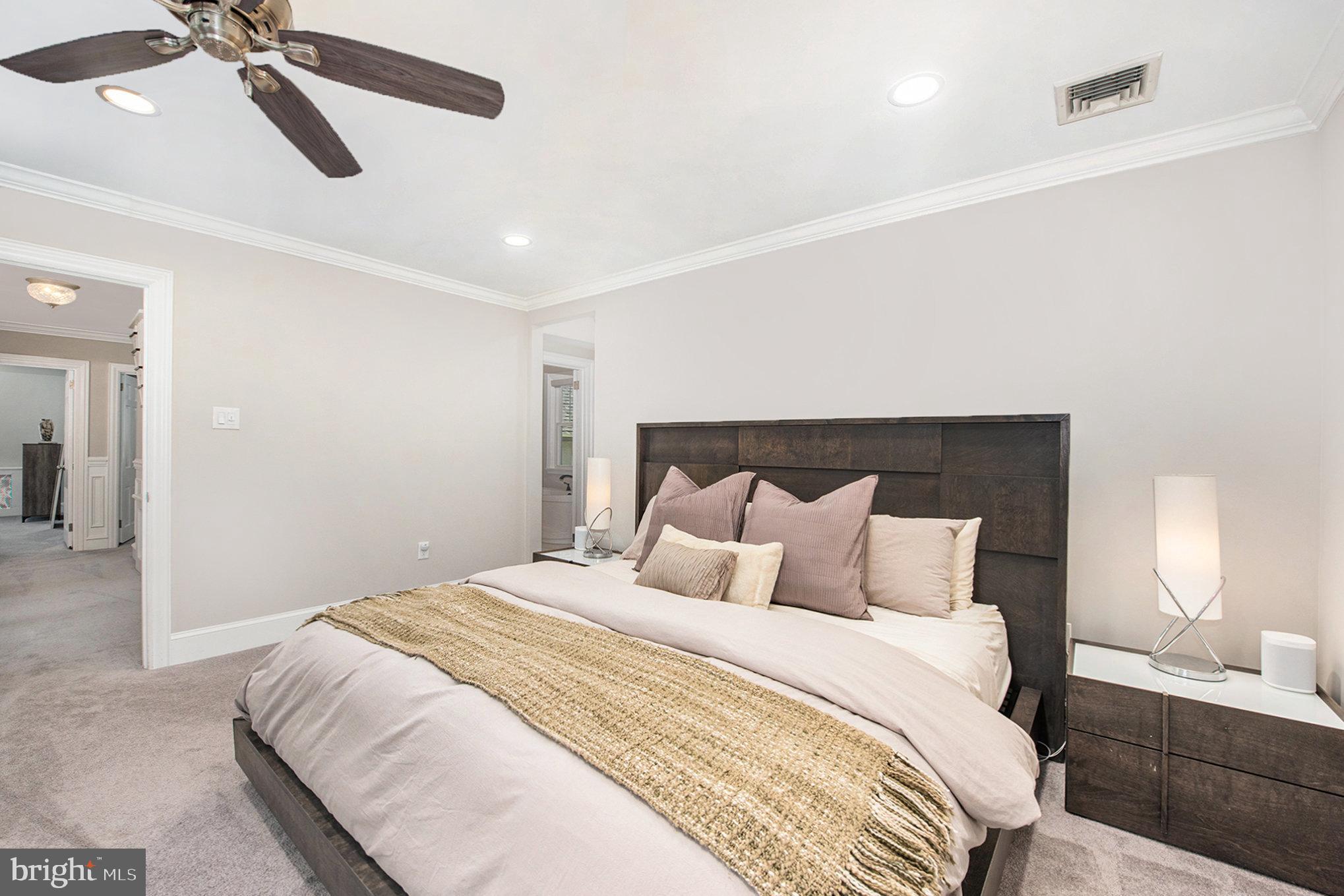 109 Willowburn Road Villanova, PA 19085 - Photo 32 of 65 a bedroom with a bed and a lamp