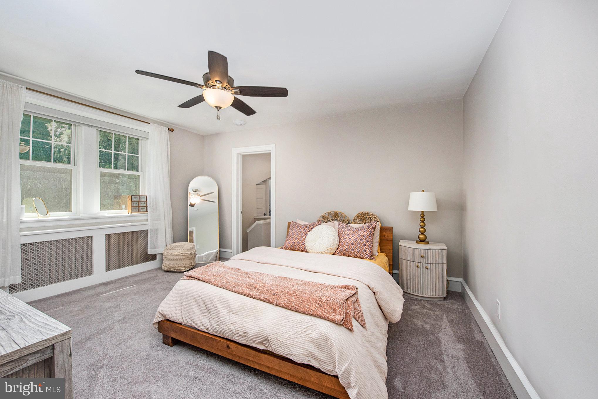 109 Willowburn Road Villanova, PA 19085 - Photo 39 of 65 a bedroom with a bed ceiling fan and window