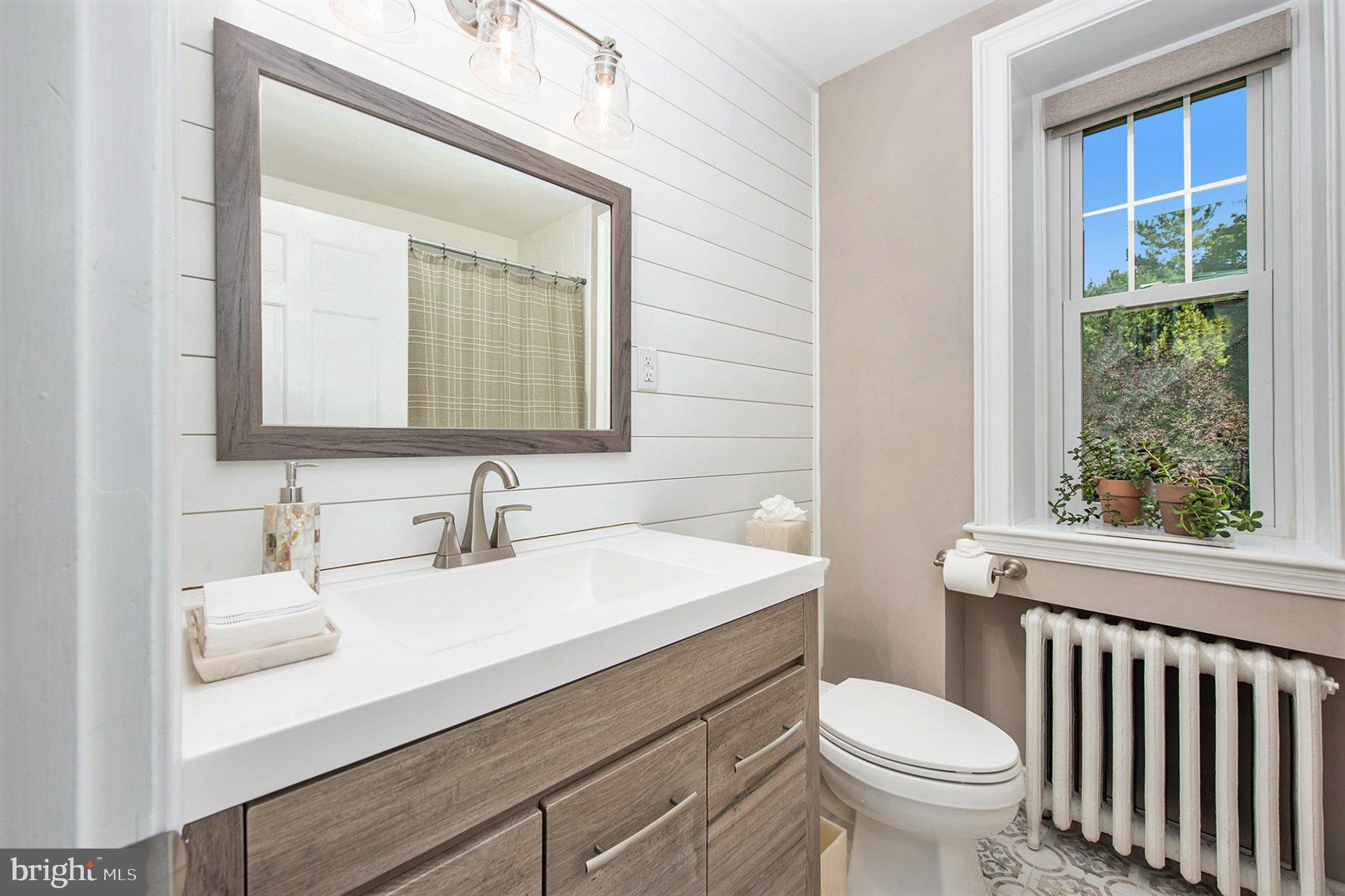 109 Willowburn Road Villanova, PA 19085 - Photo 43 of 65 a bathroom with a sink toilet and mirror