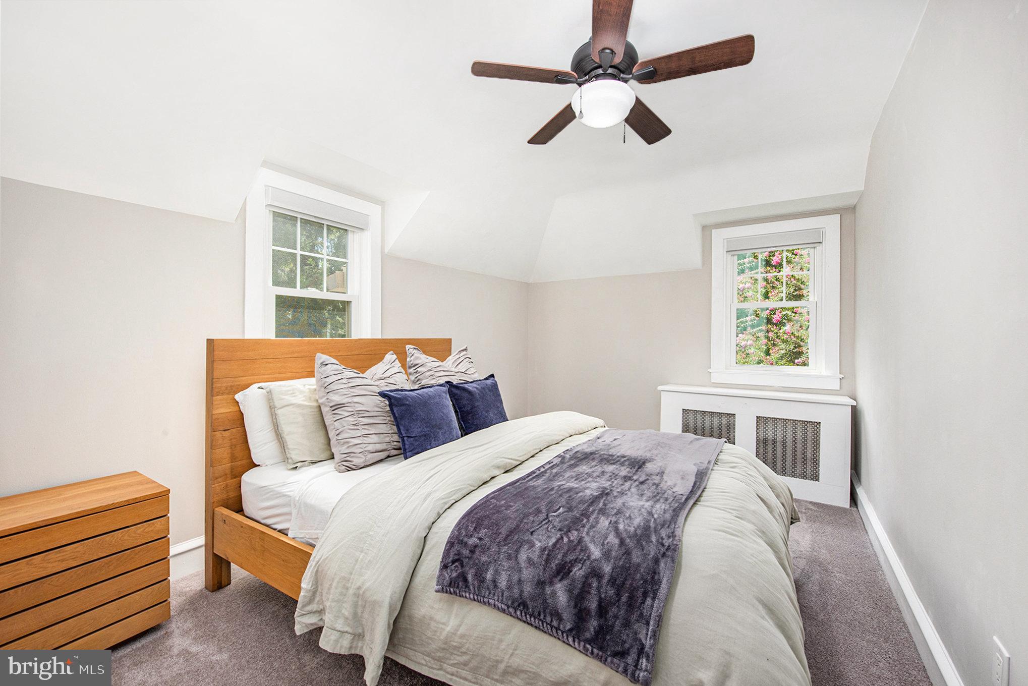 109 Willowburn Road Villanova, PA 19085 - Photo 45 of 65 a bedroom with a bed and a window