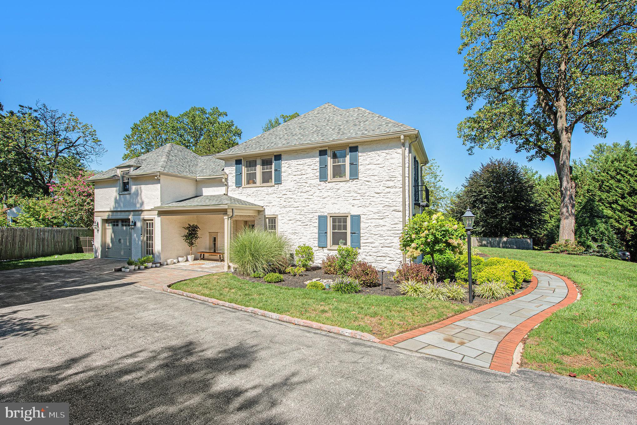109 Willowburn Road Villanova, PA 19085 - Photo 5 of 65 a front view of a house with a yard