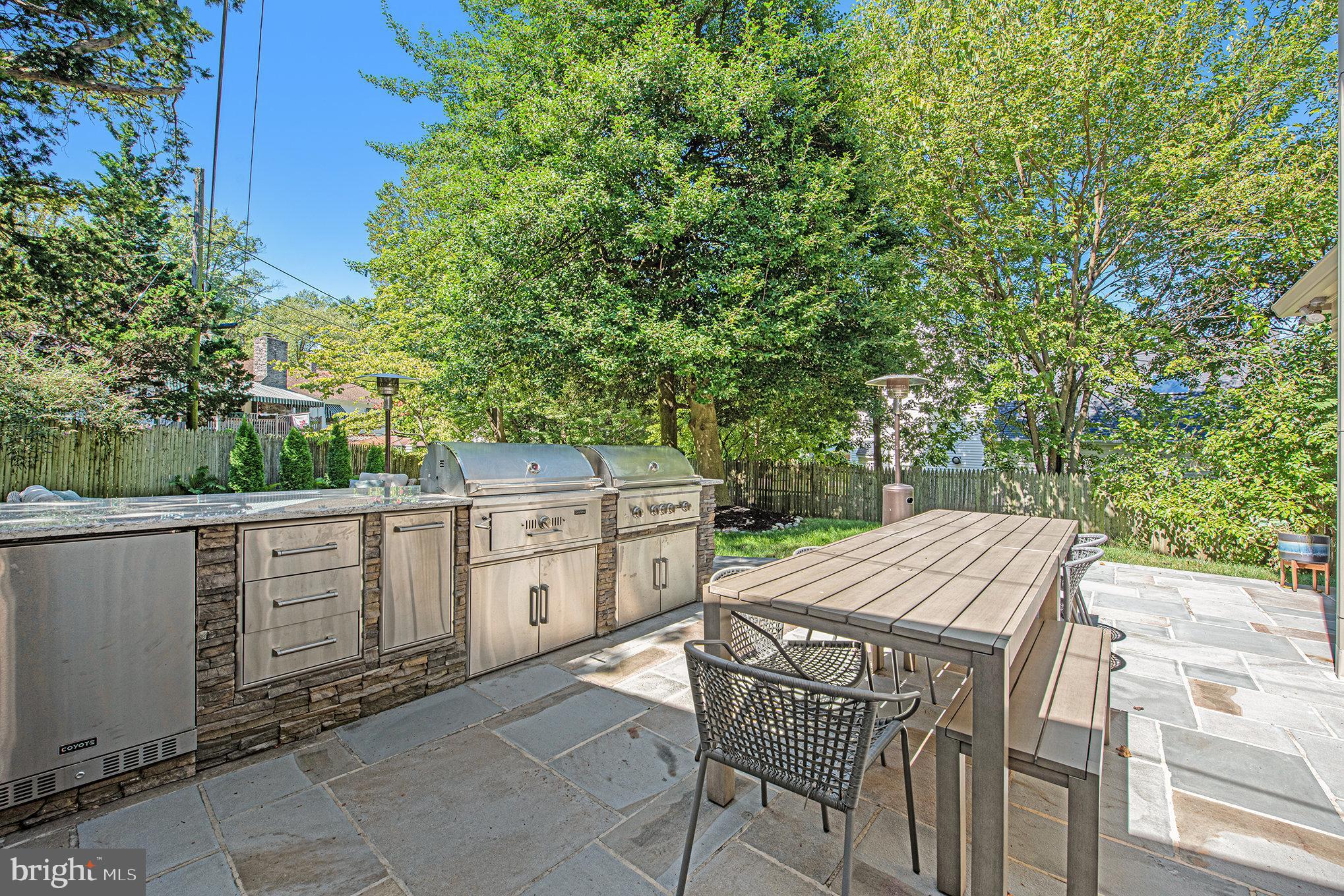 109 Willowburn Road Villanova, PA 19085 - Photo 57 of 65 a view of a dinning table and chairs in the patio