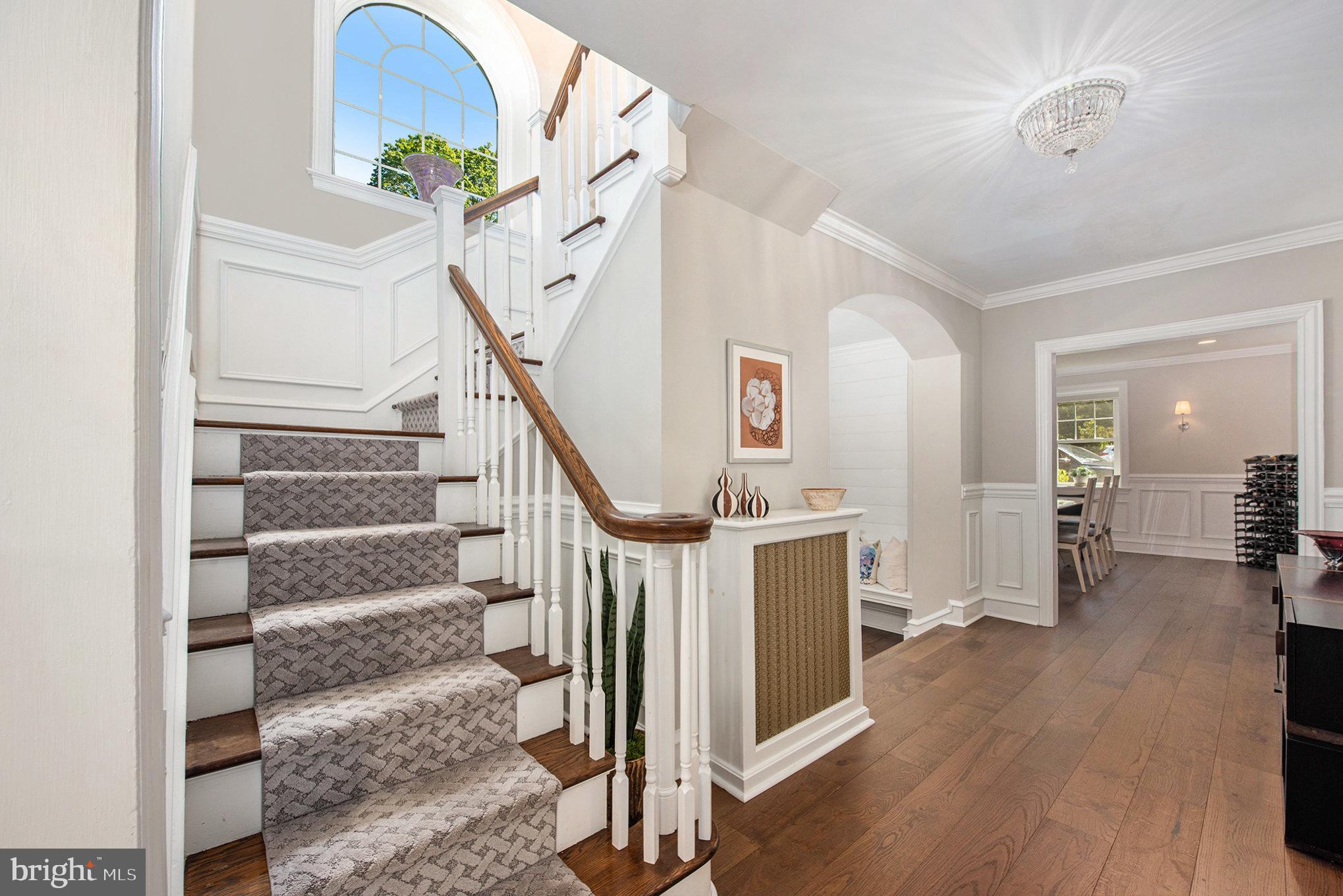 109 Willowburn Road Villanova, PA 19085 - Photo 8 of 65 a view of entryway with wooden floor and stairs