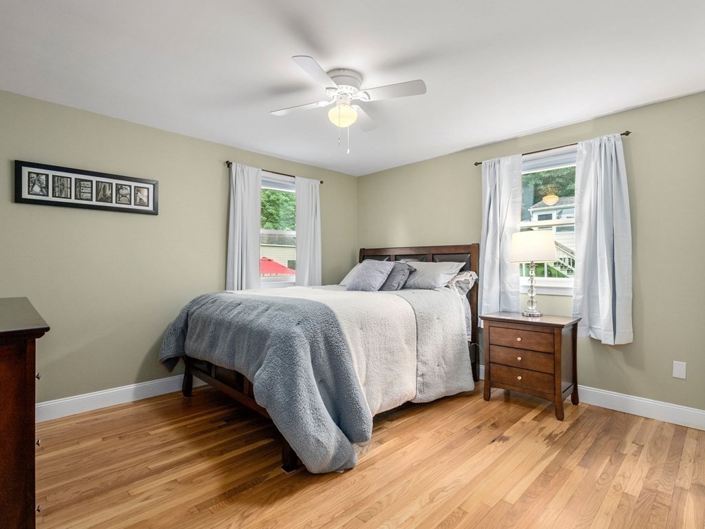 42 Priest Street Hudson, MA 01749 - Photo 12 of 23 a bedroom with a bed and a window
