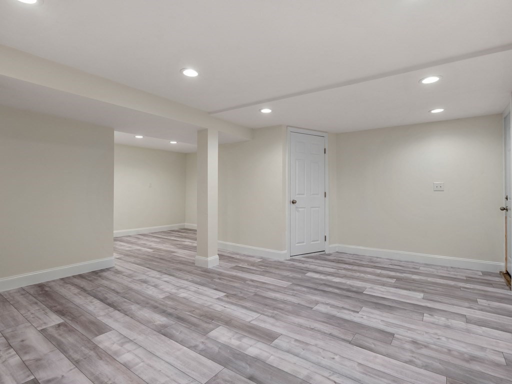 42 Priest Street Hudson, MA 01749 - Photo 14 of 23 a view of empty room with wooden floor