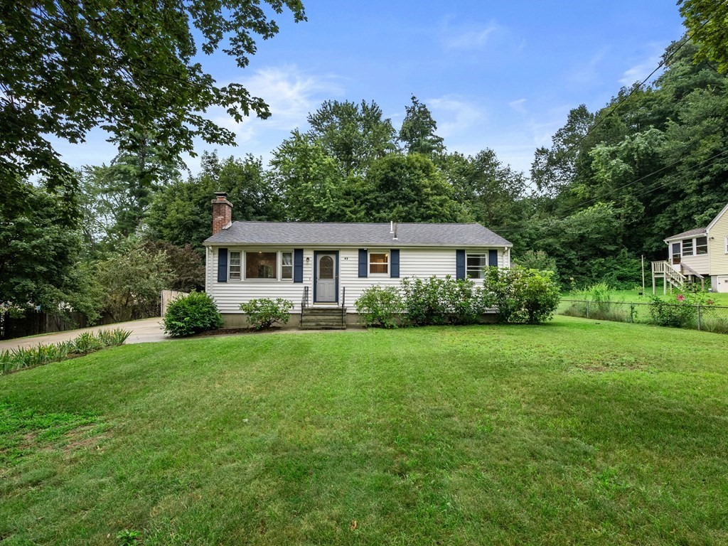 42 Priest Street Hudson, MA 01749 - Photo 2 of 23 a front view of house with yard and green space