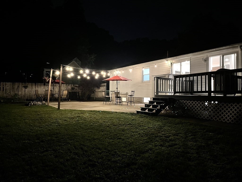 42 Priest Street Hudson, MA 01749 - Photo 22 of 23 a view of a house with backyard and sitting area