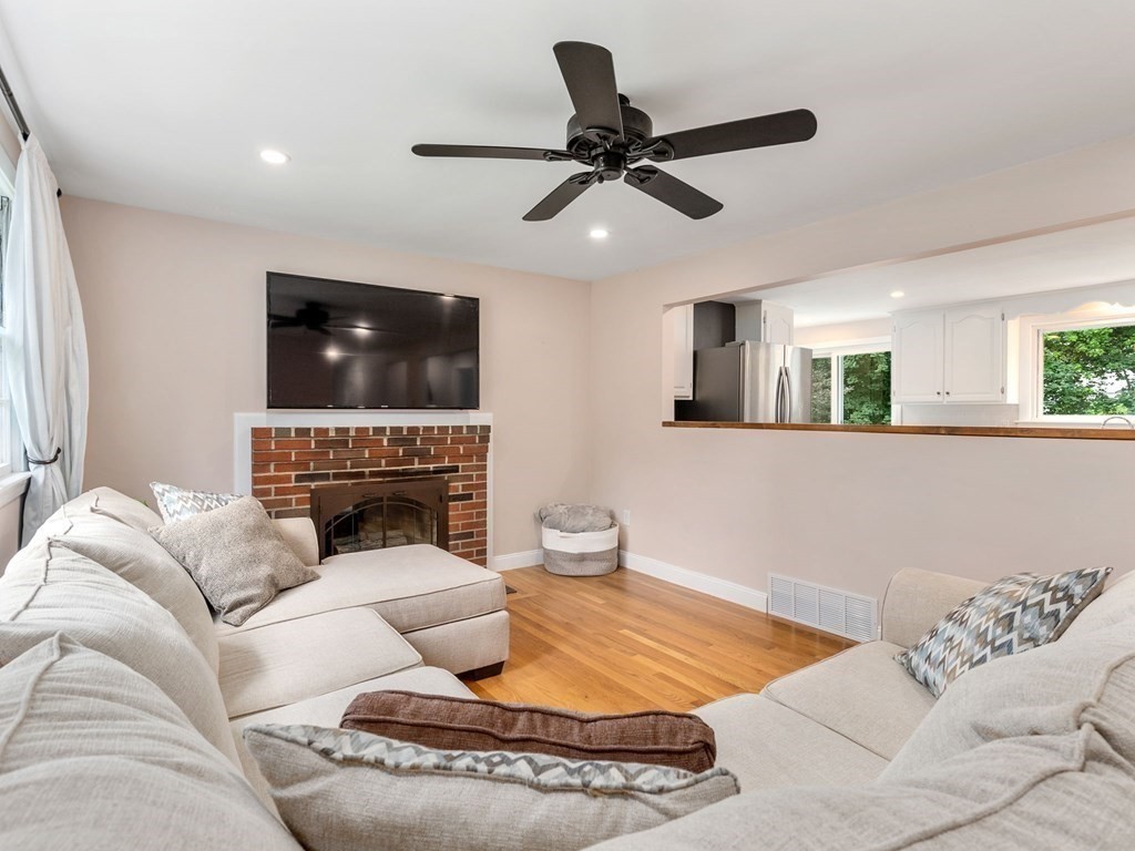 42 Priest Street Hudson, MA 01749 - Photo 5 of 23 a living room with furniture and a flat screen tv