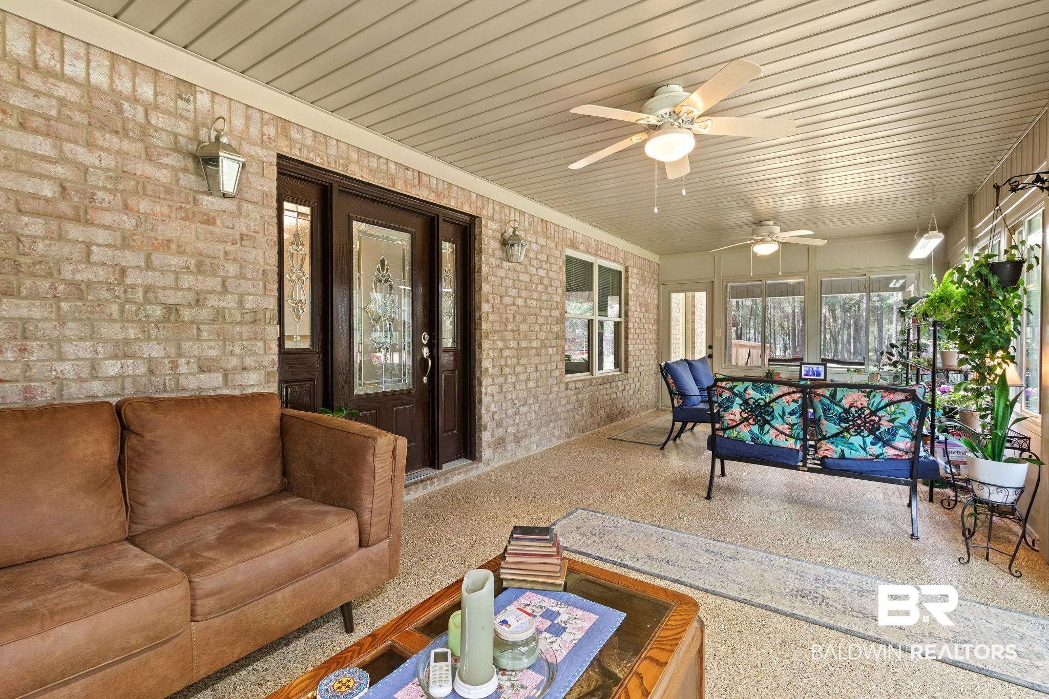 24250 Hack Road Bay Minette, AL 36507 - Photo 3 of 88 Sunroom / solarium featuring ceiling fan and outdoor lounge area