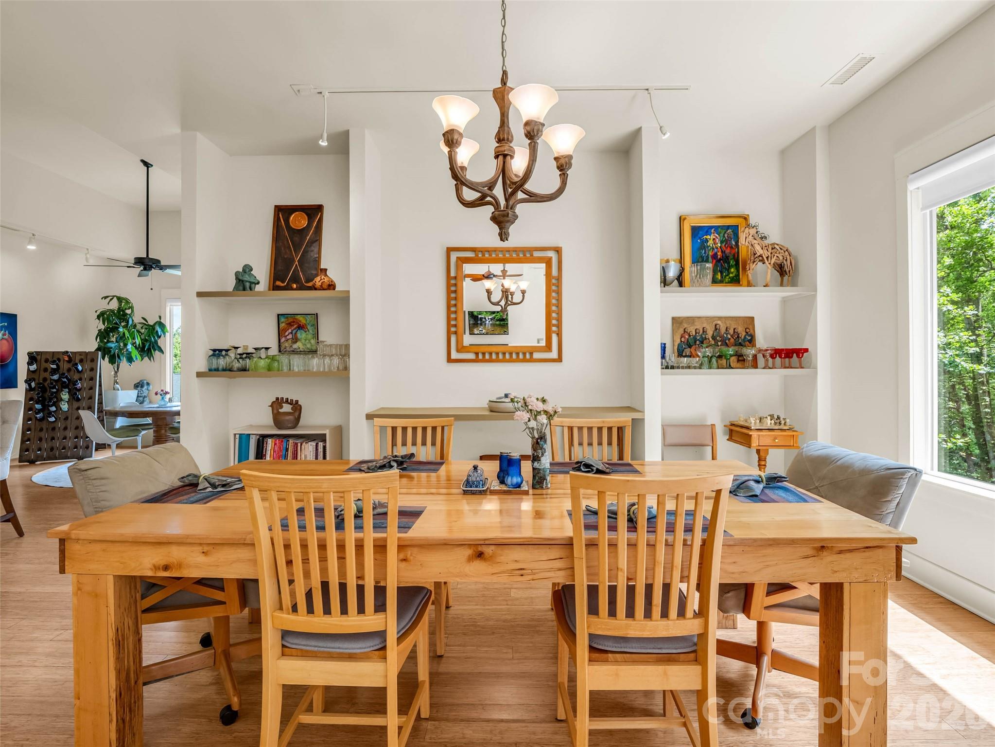 120 Glenn Court Mill Spring, NC 28756 - Photo 15 of 48 a view of a dining room with furniture window and wooden floor