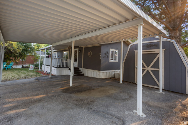 271 Mindella Way Layton, UT 84041 - Photo 23 of 27 Dual carport structure providing covered parking