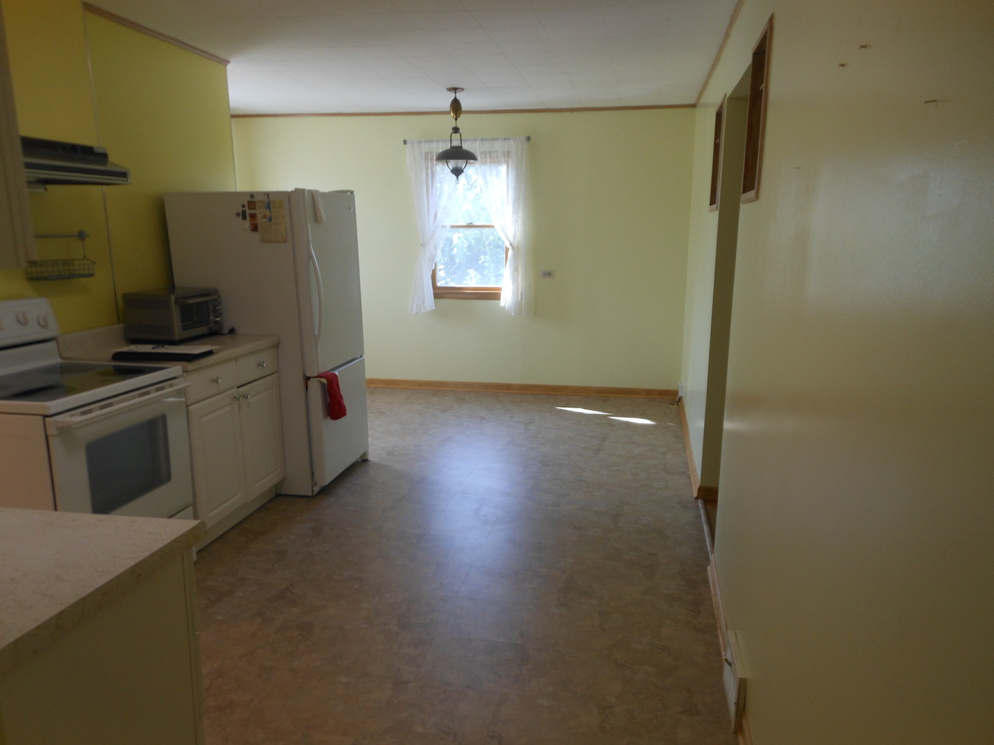 15003 High Road Lockport, IL 60441 - Photo 12 of 30 a kitchen with stainless steel appliances a refrigerator and a stove