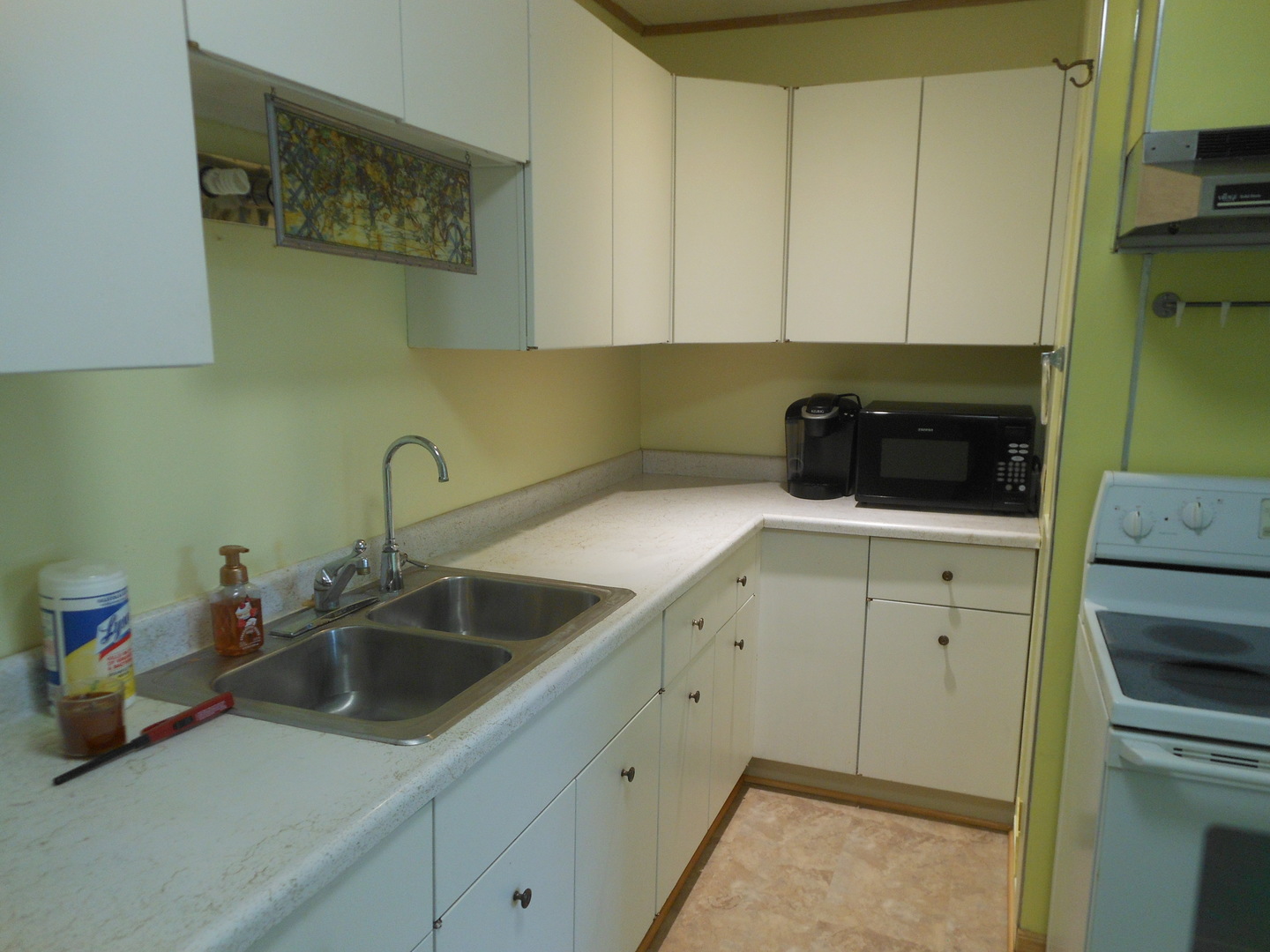 15003 High Road Lockport, IL 60441 - Photo 13 of 30 a kitchen with a sink and cabinets