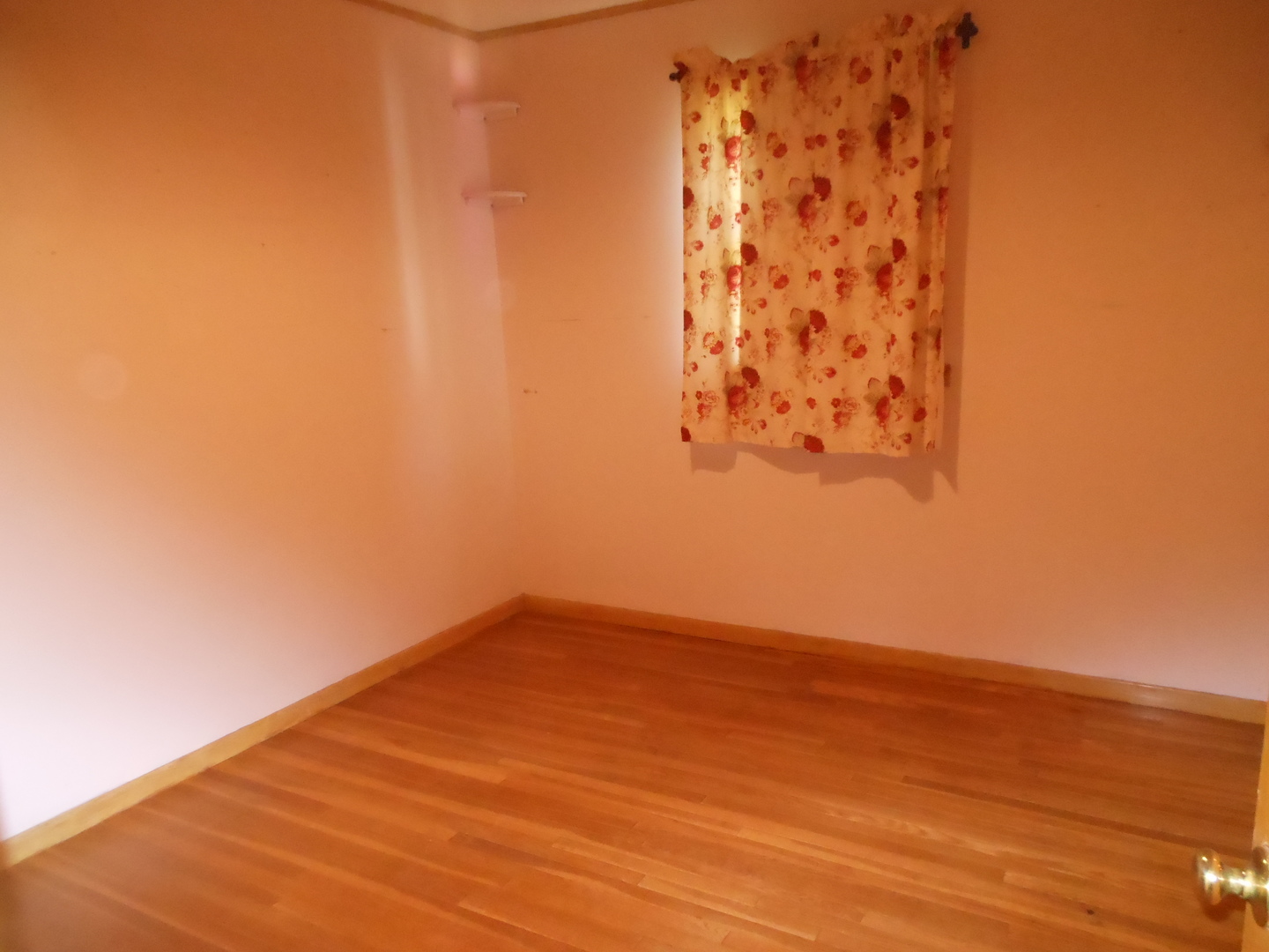 15003 High Road Lockport, IL 60441 - Photo 15 of 30 a view of an empty room with wooden floor and a window