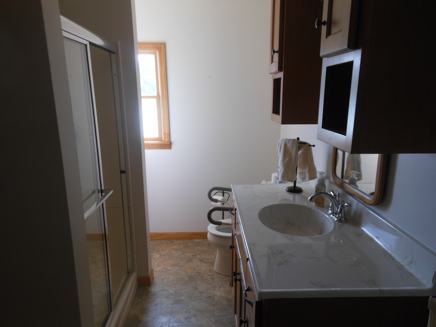 15003 High Road Lockport, IL 60441 - Photo 20 of 30 a bathroom with a sink and a mirror