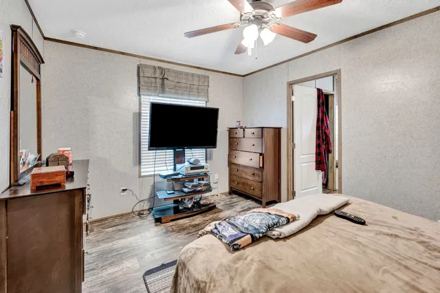 a bathroom with double vanity sink and a bathtub
