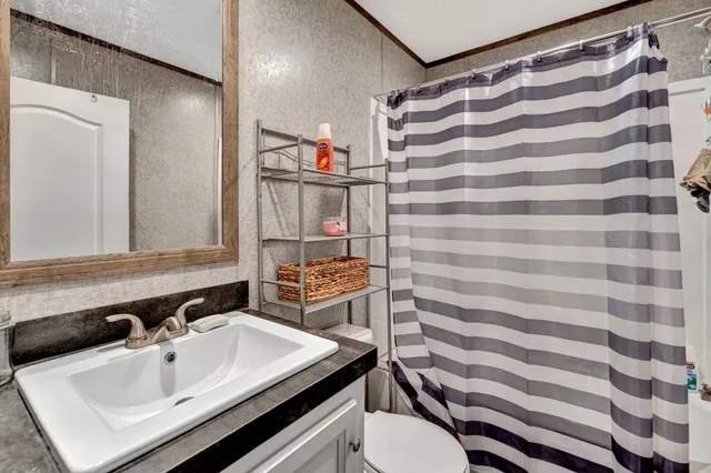 a view of balcony with wooden floor and outdoor seating