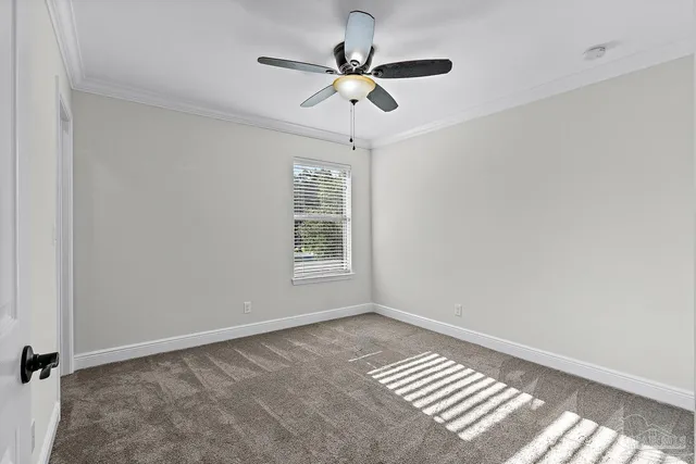 a view of a hallway with wooden floor and closet