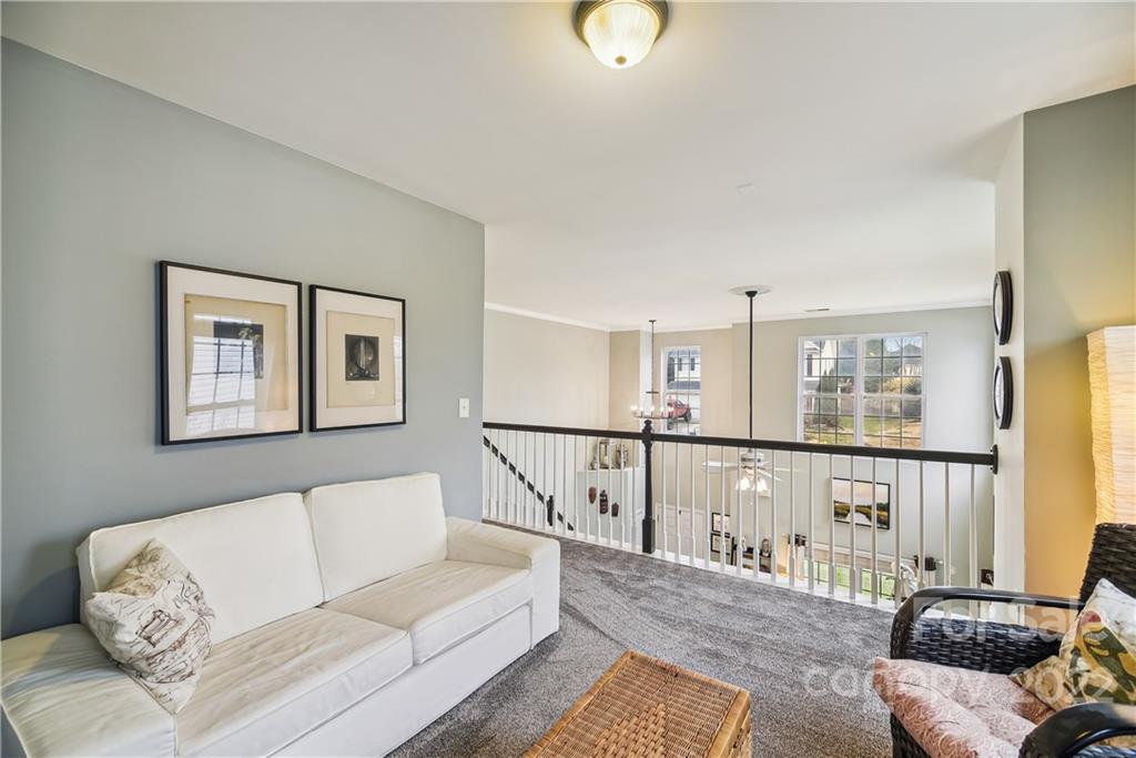 5533 Alexandrite Way Fort Mill, SC 29708 - Photo 12 of 27 a living room with furniture and a window