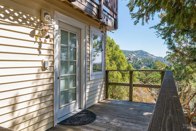 a view of a porch with a bench