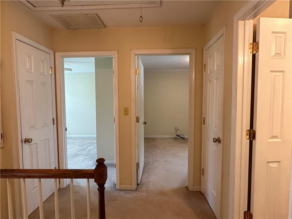 241 Olde Quarry Road Graham, NC 27253 - Photo 22 of 30 a view of a hallway with closet and front door
