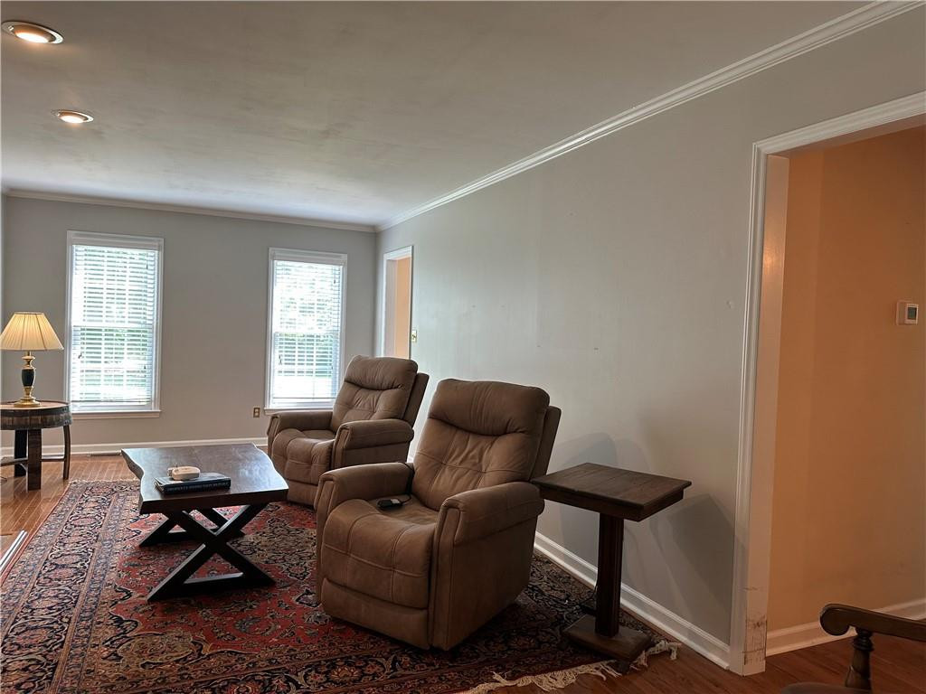 241 Olde Quarry Road Graham, NC 27253 - Photo 7 of 30 a living room with furniture a window and a table