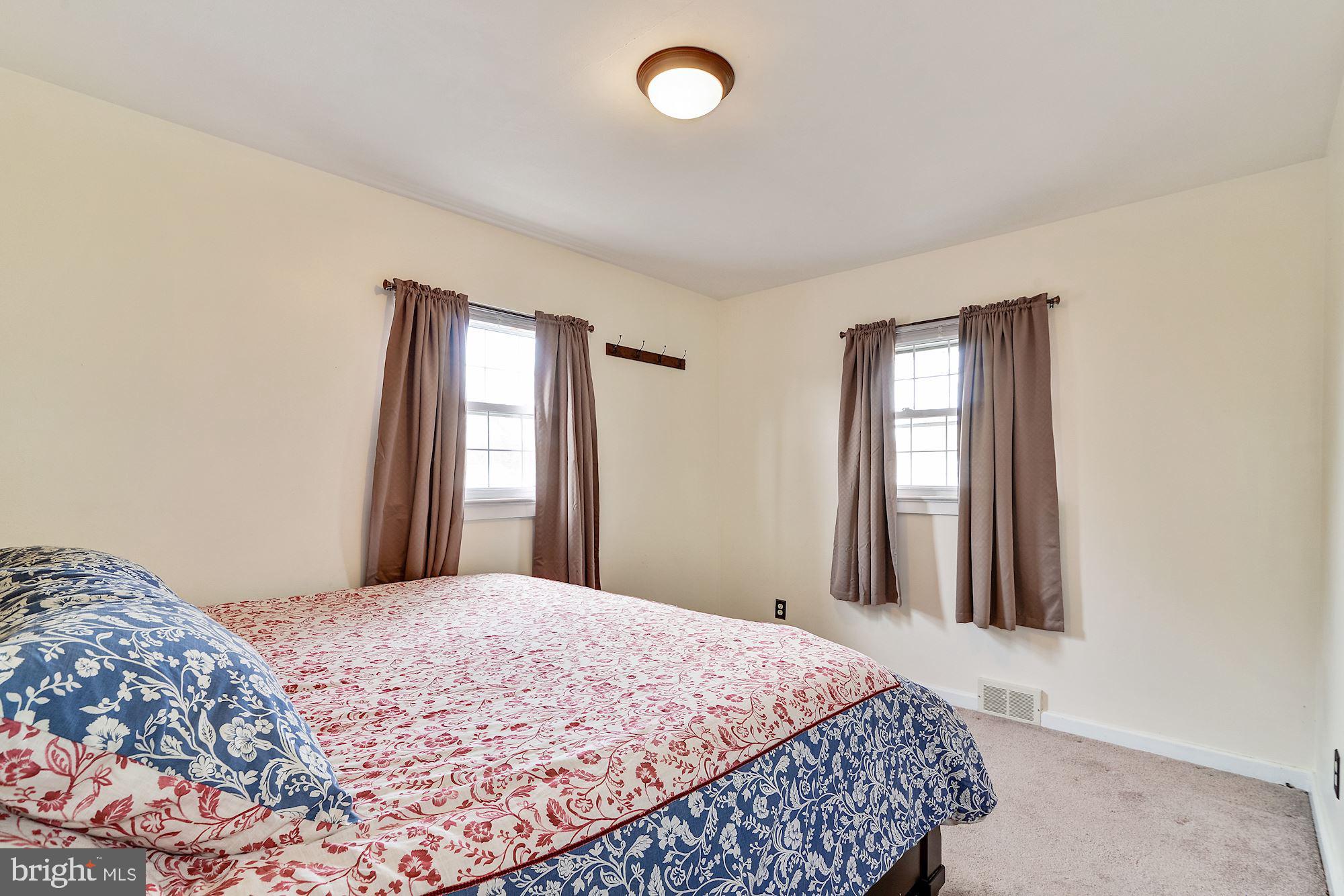 16 Stanger Road Bridgeton, NJ 08302 - Photo 22 of 34 a bedroom with a bed and a window