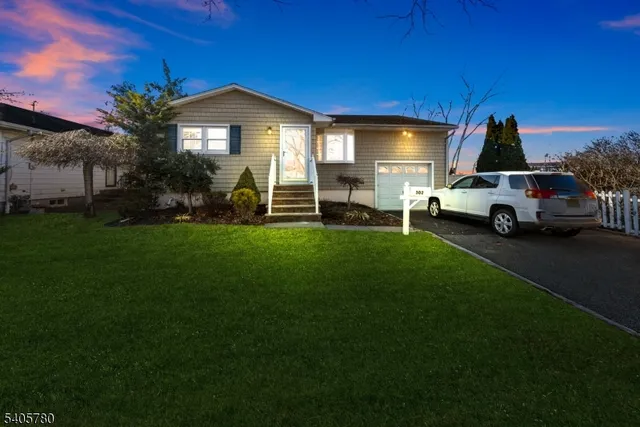 a view of a car in front of house