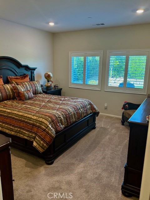 28340 Memory Lane Winchester, CA 92596 - Photo 16 of 39 a bedroom with a bed and a window
