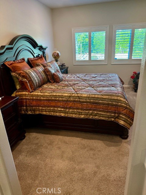 28340 Memory Lane Winchester, CA 92596 - Photo 17 of 39 a bedroom with a bed and a window