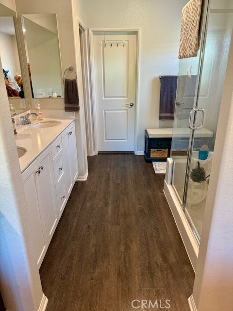28340 Memory Lane Winchester, CA 92596 - Photo 18 of 39 a spacious bathroom with a double vanity sink and a mirror