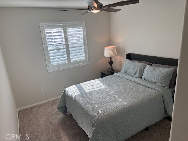 28340 Memory Lane Winchester, CA 92596 - Photo 24 of 39 a bedroom with a bed and window