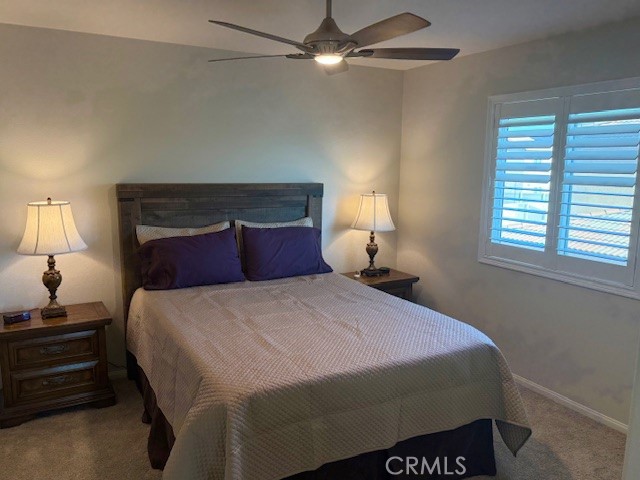 28340 Memory Lane Winchester, CA 92596 - Photo 29 of 39 a bedroom with a bed and window