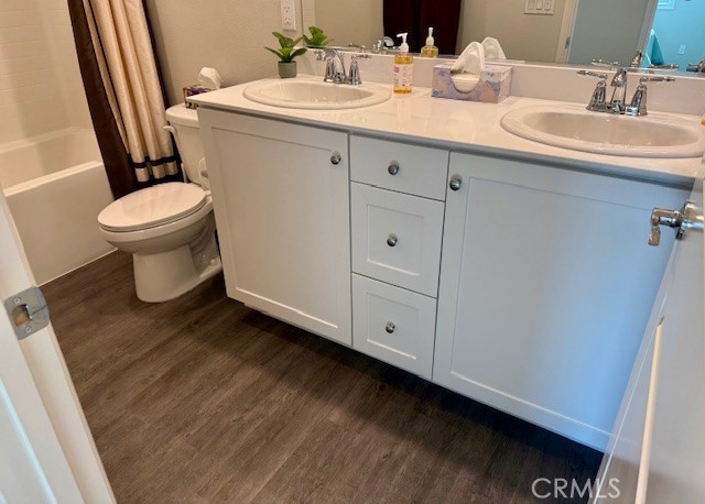 28340 Memory Lane Winchester, CA 92596 - Photo 30 of 39 a bathroom with a sink and a toilet