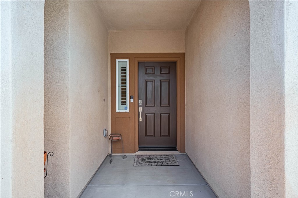 28340 Memory Lane Winchester, CA 92596 - Photo 3 of 39 a view of an entryway door