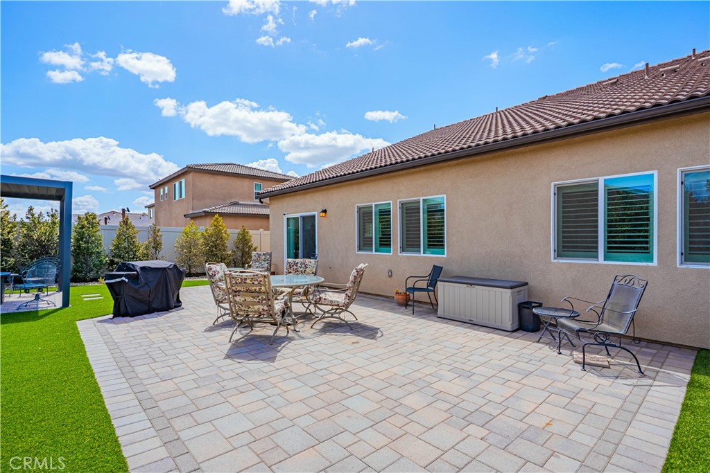 28340 Memory Lane Winchester, CA 92596 - Photo 31 of 39 a view of a patio with couches and potted plants