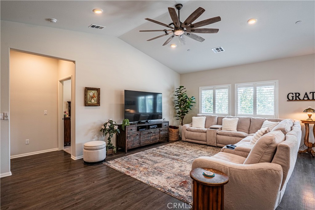 28340 Memory Lane Winchester, CA 92596 - Photo 8 of 39 a living room with furniture and a flat screen tv