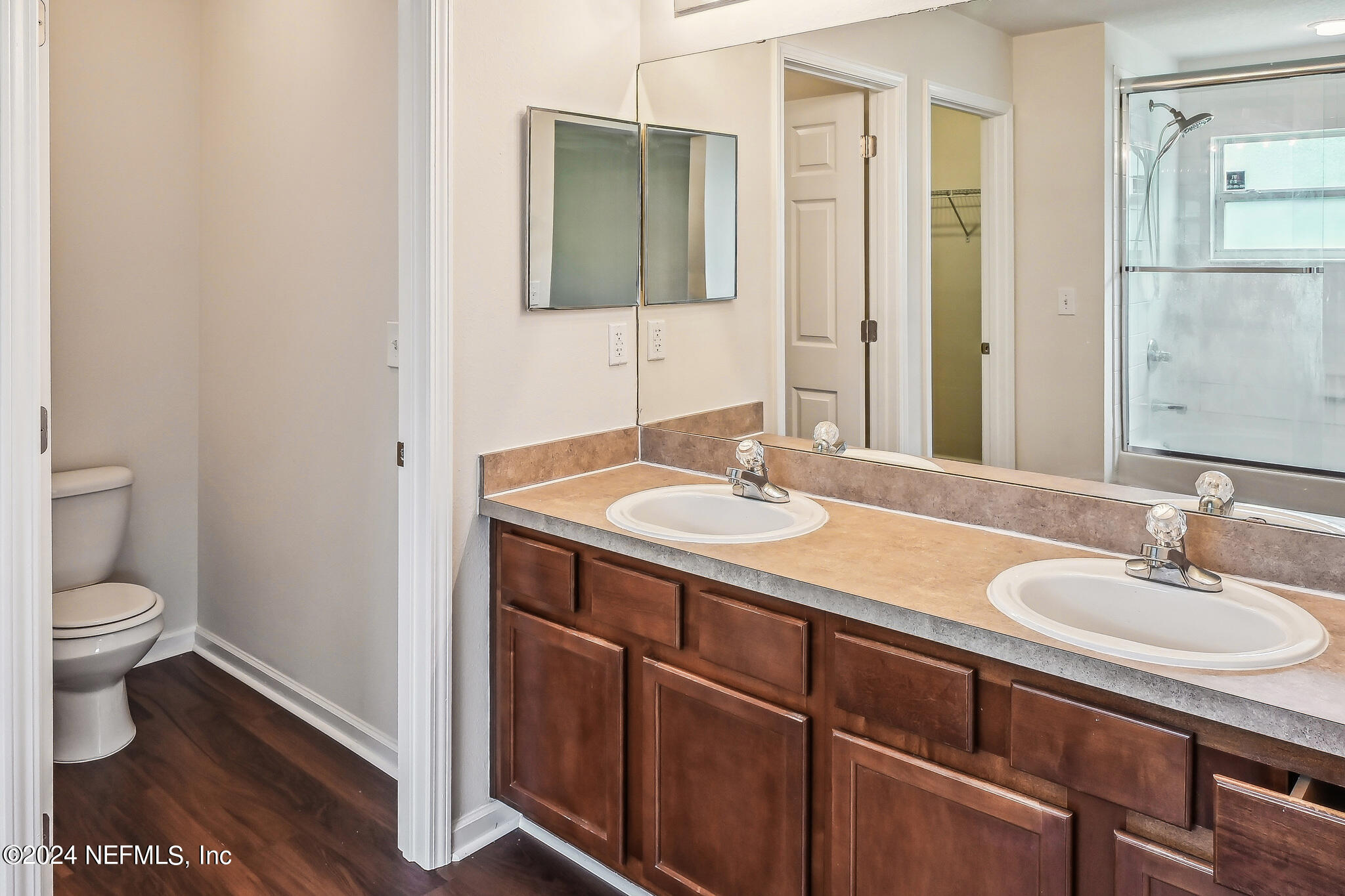 15234 Bareback Drive Jacksonville, FL 32234 - Photo 12 of 21 a bathroom with a sink a toilet and shower