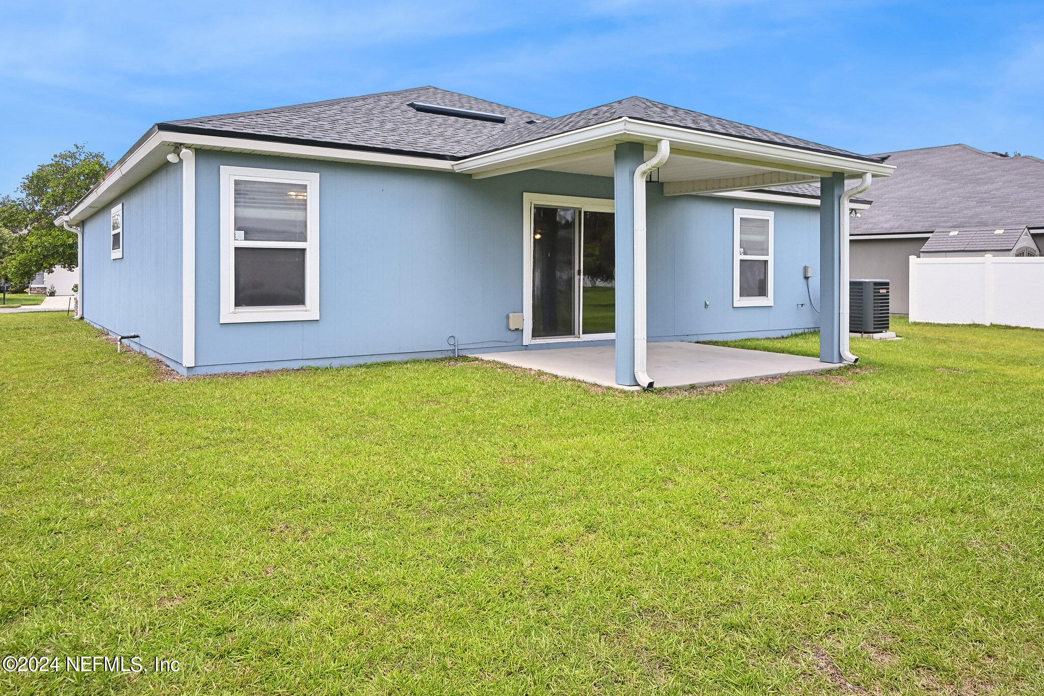 15234 Bareback Drive Jacksonville, FL 32234 - Photo 2 of 21 a front view of house with yard and garage