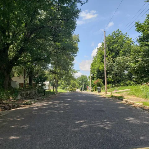 a view of a house with a big yard