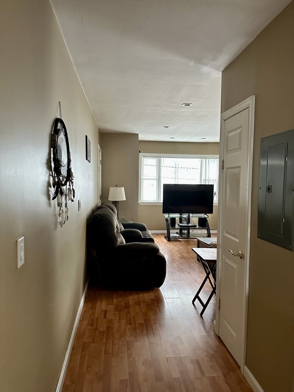 166 Bradford Avenue Fall River, MA 02721 - Photo 15 of 28 a living room with furniture and a flat screen tv